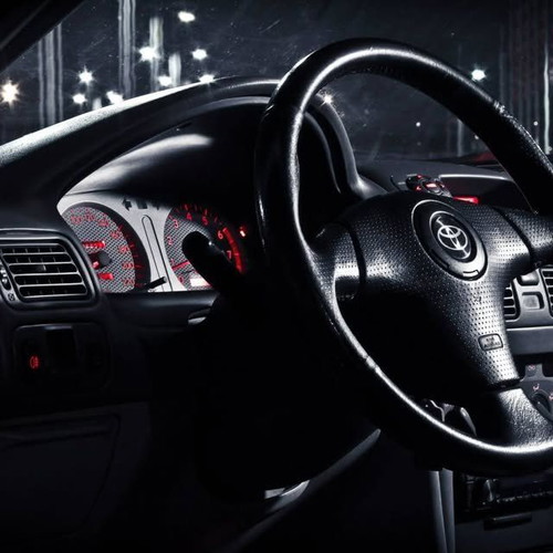 Toyota three-spoke leather steering wheel with airbag horn