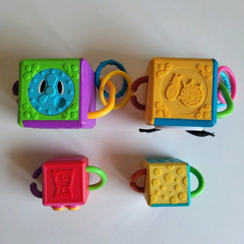 4 Hasbro Chain Cubes used, educational toy