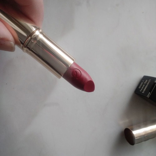 Giordani Gold lipstick bright red and 3 slightly used Avon nail polishes