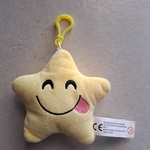 Star bath keychain like new, yellow with tongue