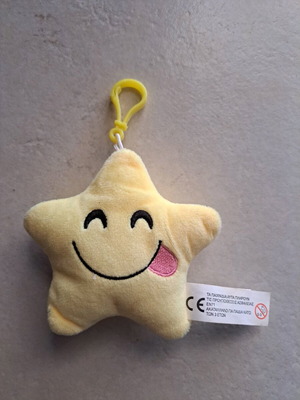 Star bath keychain like new, yellow with tongue