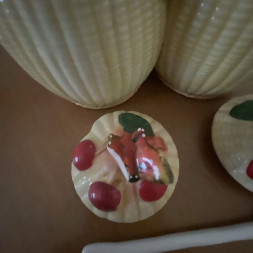 Ceramic jam pots used with spoons and decorative butterfly