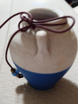 Decorative two-tone miniature clay vase used, white and blue