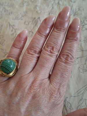 Ring with green malachite stone, like new, adjustable