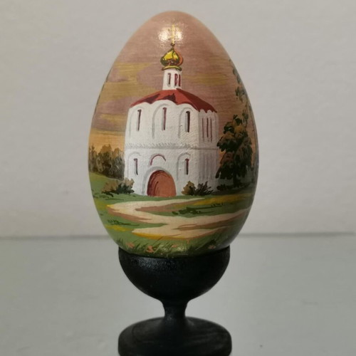 Russian egg used with hand-painted design and wooden base