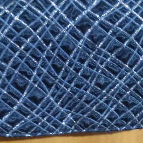 Black shoulder bag with embossed geometric pattern, like new