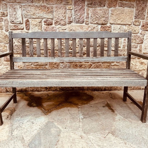 Outdoor bench used, made of solid teak wood