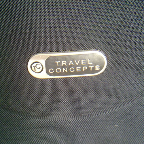 Wheeled travel suitcases, black and grey, like new