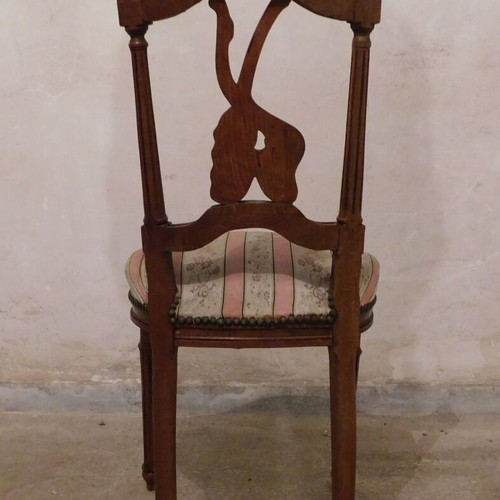 Pair of carved wooden chairs with striped fabric seat like new