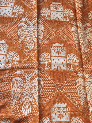 Traditional vintage woven textile with White Tower and Double-headed Eagle, orange and white