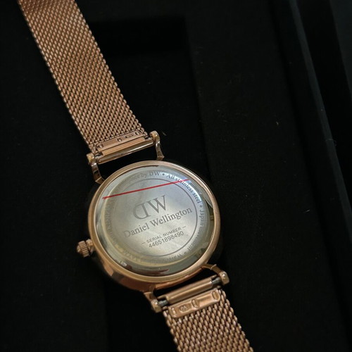 Daniel Wellington Petite Unitone watch with rose gold metal bracelet