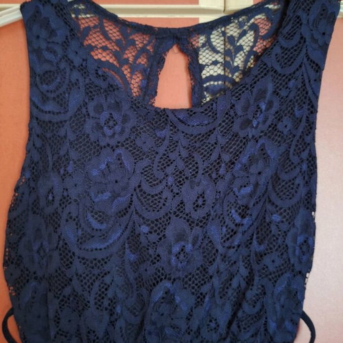 Sleeveless dress like new with back design, size L
