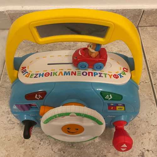 Fisher Price driving toy used with sounds and activities