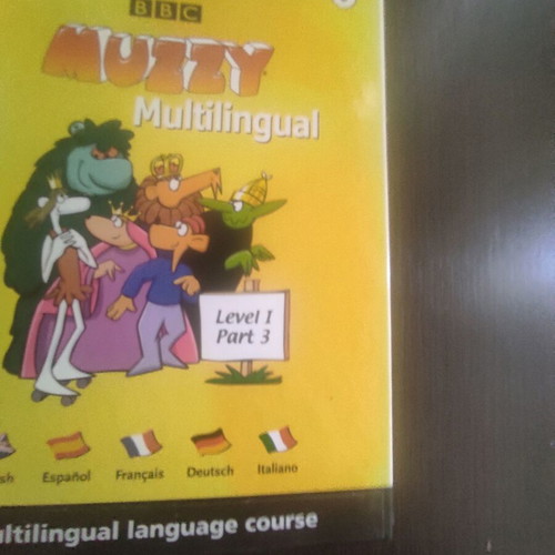 Muzzy language learning books used, pack of 5 books and 3 DVDs