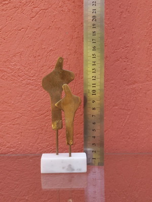 Brass sculpture used on marble base