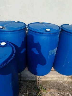 Blue 210-liter plastic barrels like new for industrial use