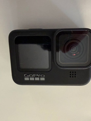 GoPro Hero 9 Black action camera with case and battery