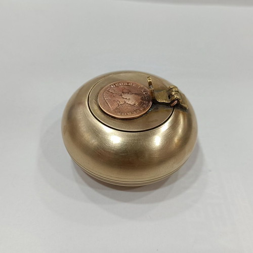 Brass pocket ashtray with glued George V King Emperor coin used