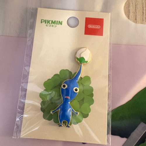 Nintendo Store Pikmin pin, Yoshi plate, pens, towel, Zelda bag