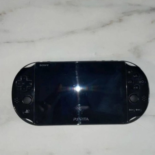 PlayStation Vita like new with 4 games, case and 8GB memory card