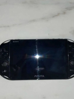 PlayStation Vita like new with 4 games, case and 8GB memory card