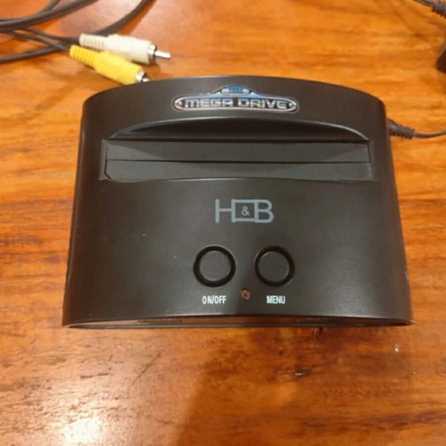 Sega Mega Drive Mini console like new with wireless controllers and preinstalled games