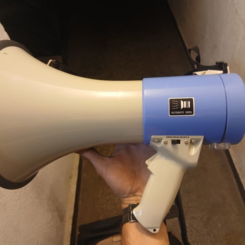 Professional grade megaphone brand new with microphone and shoulder strap
