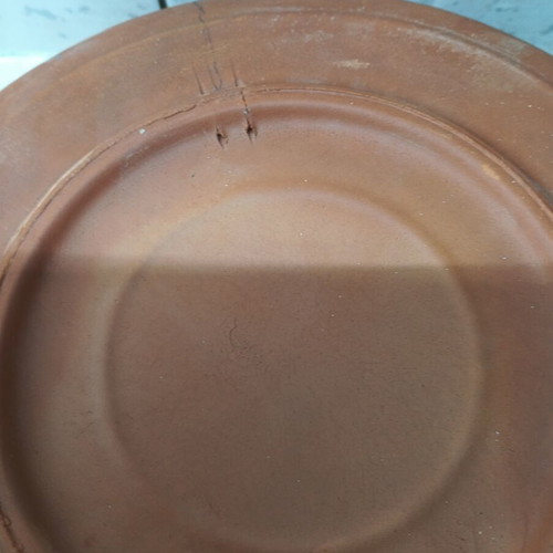 Handmade terracotta ceramics like new with holes for hanging