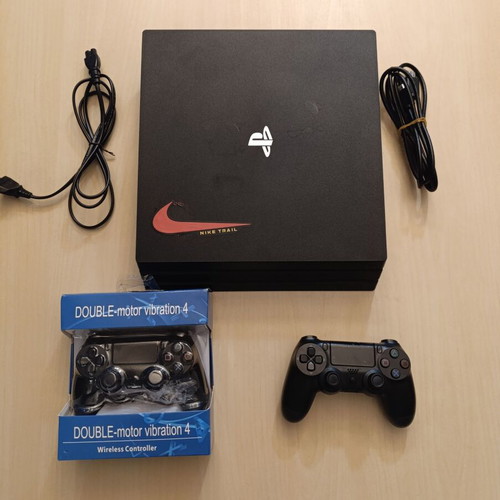 PlayStation 4 Pro 1TB used, complete bundle with 2 controllers