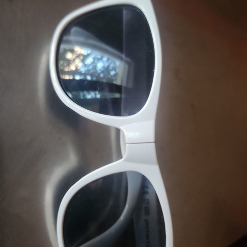 Children's sunglasses with foldable frame like new, white