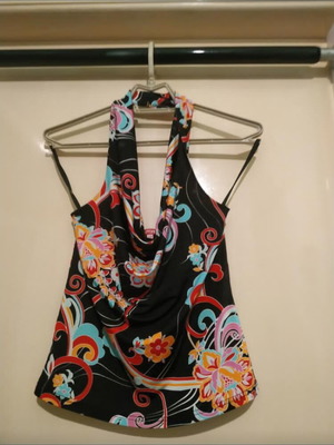 Halter neck blouse used with printed designs and ruffles, size M