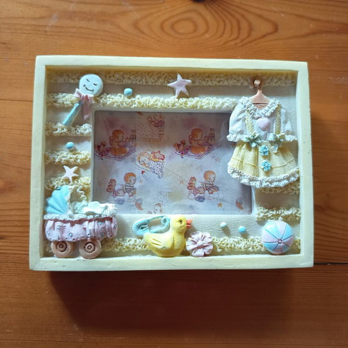 Set of 4 baby photo frames, 3 vertical and 1 horizontal