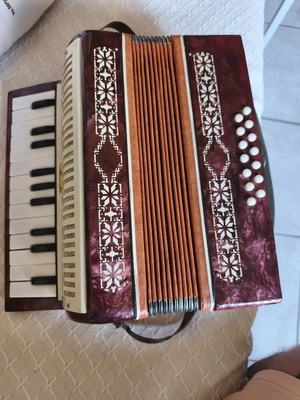 Malysh Soviet vintage children's accordion 1982 with 23 keys and 16 basses