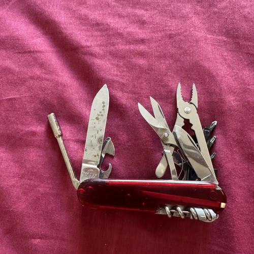 Victorinox SwissTool multitool used, authentic Swiss pocket knife