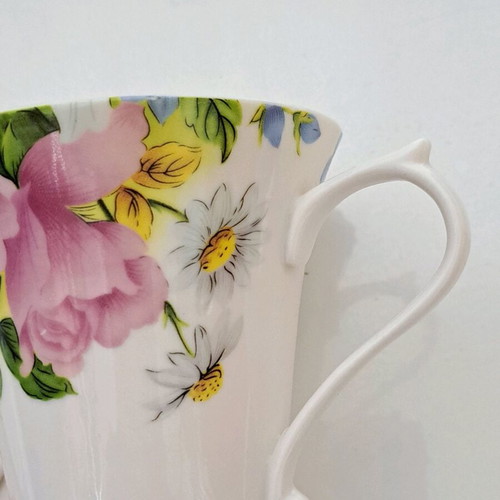 Porcelain cup and saucer set like new