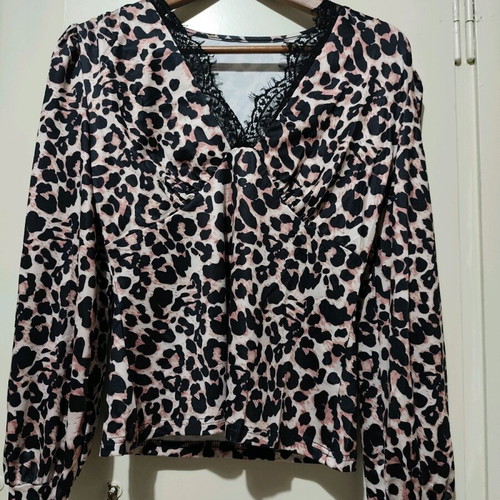 Animal print blouse new with lace detail, size S