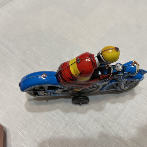 Motorcyclist tin toy like new, made in West Germany