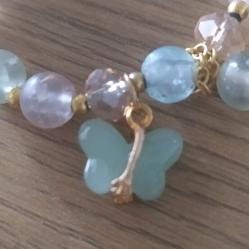 Women's bracelet like new with pastel stones and steel details