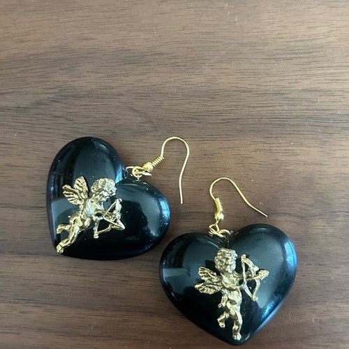 Vintage heart-shaped dangling earrings with embossed angels like new