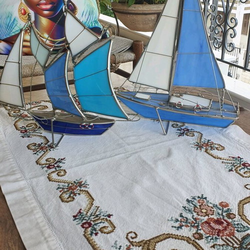 Set of sailboats like new made of steel and glass