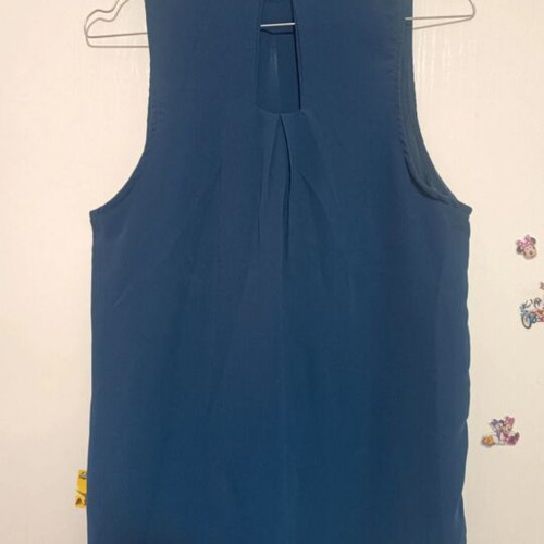 Blue sleeveless blouse Small like new with lining and back buttons