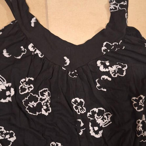Blouse used, black and white with adjustable cord waist, size L