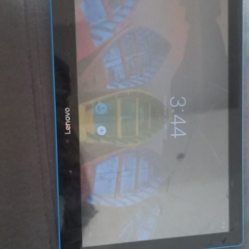 Lenovo tablet used with scratches on screen and back