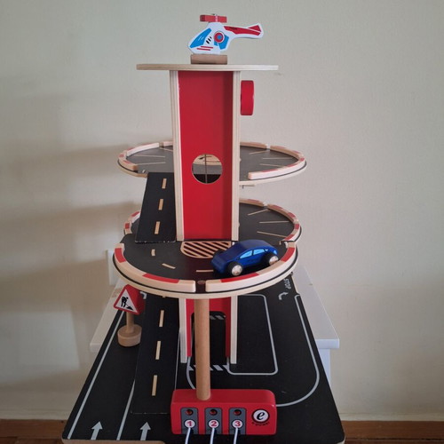 Hape wooden three-level car garage with elevator and vehicles