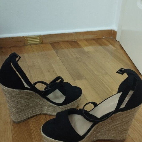 Black platform shoes used with strap wear, size 39