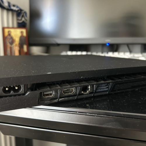 PlayStation 4 Slim 1TB like new with 2 controllers and 6 games