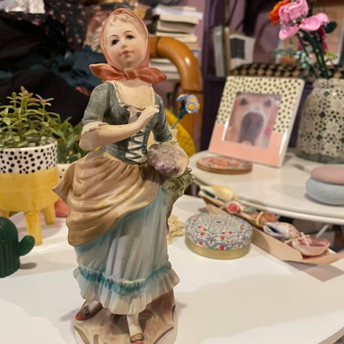Porcelain decorative figurine of a girl with matte finish like new