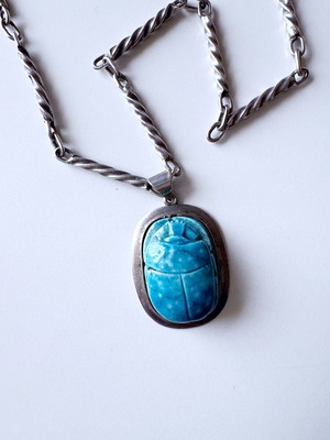 Pendant with turquoise stone steel like new