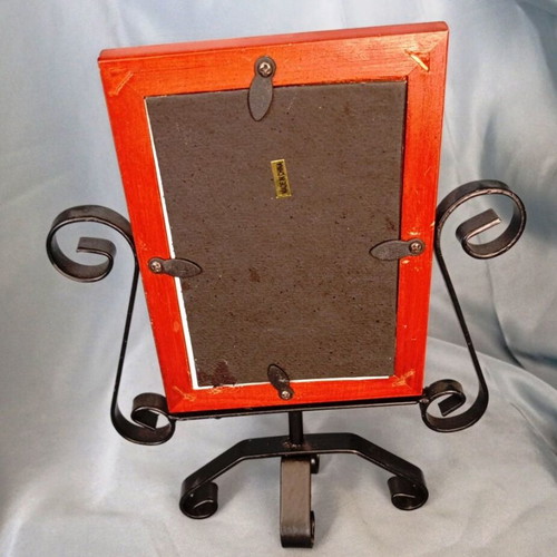 Rotating wooden photo frame with metal decorative base like new