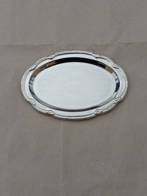 Silver-plated oval serving tray used with floral design